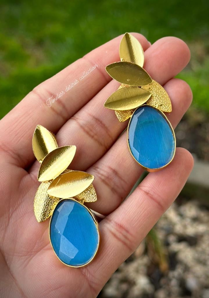 Sky blue western look earrings with gold plating
