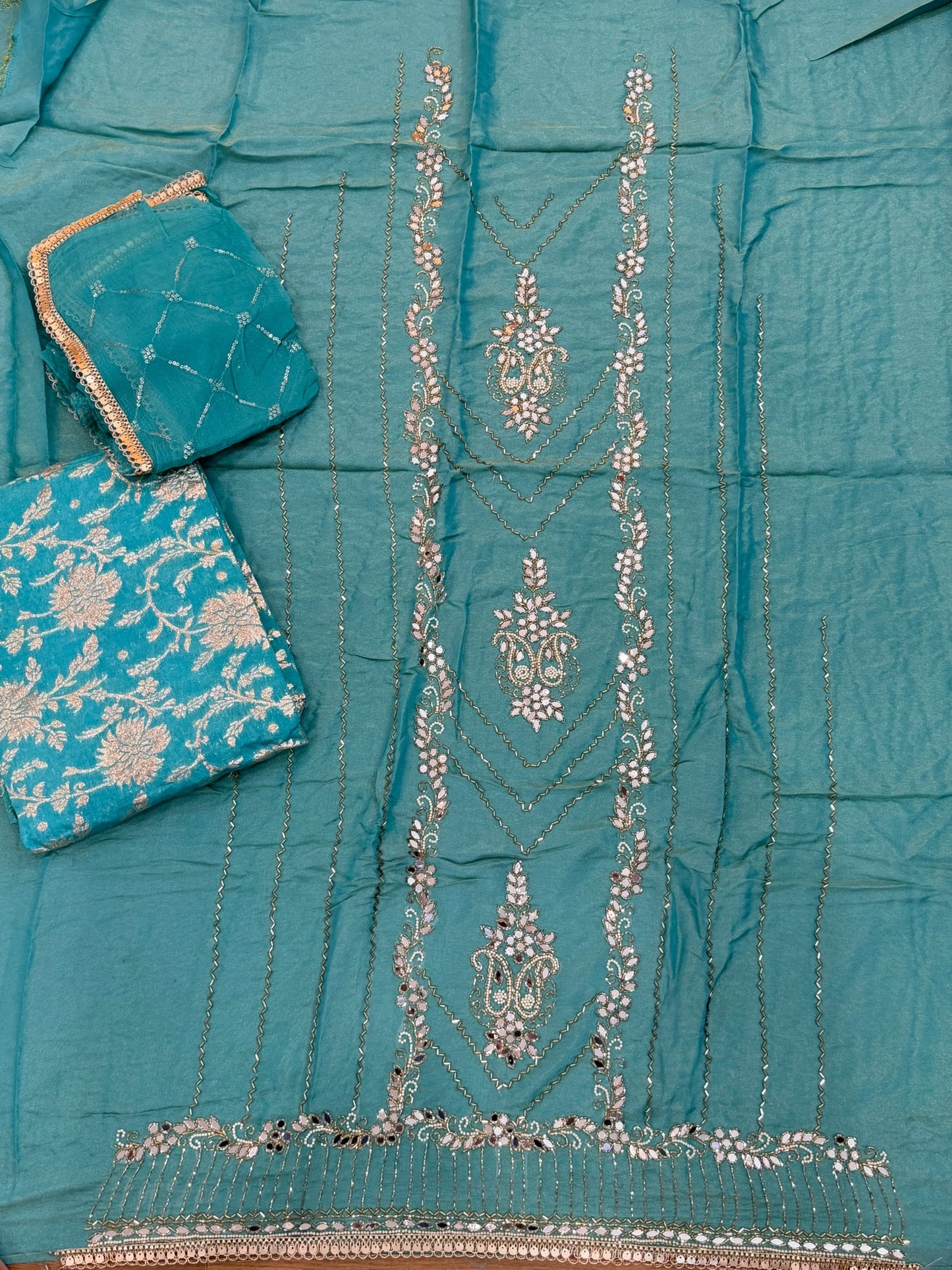 Unstitched handwork Suit - shirt: shimmer silk , bottom : Banarsi , Duppata : chiffon ( colour - firozi )