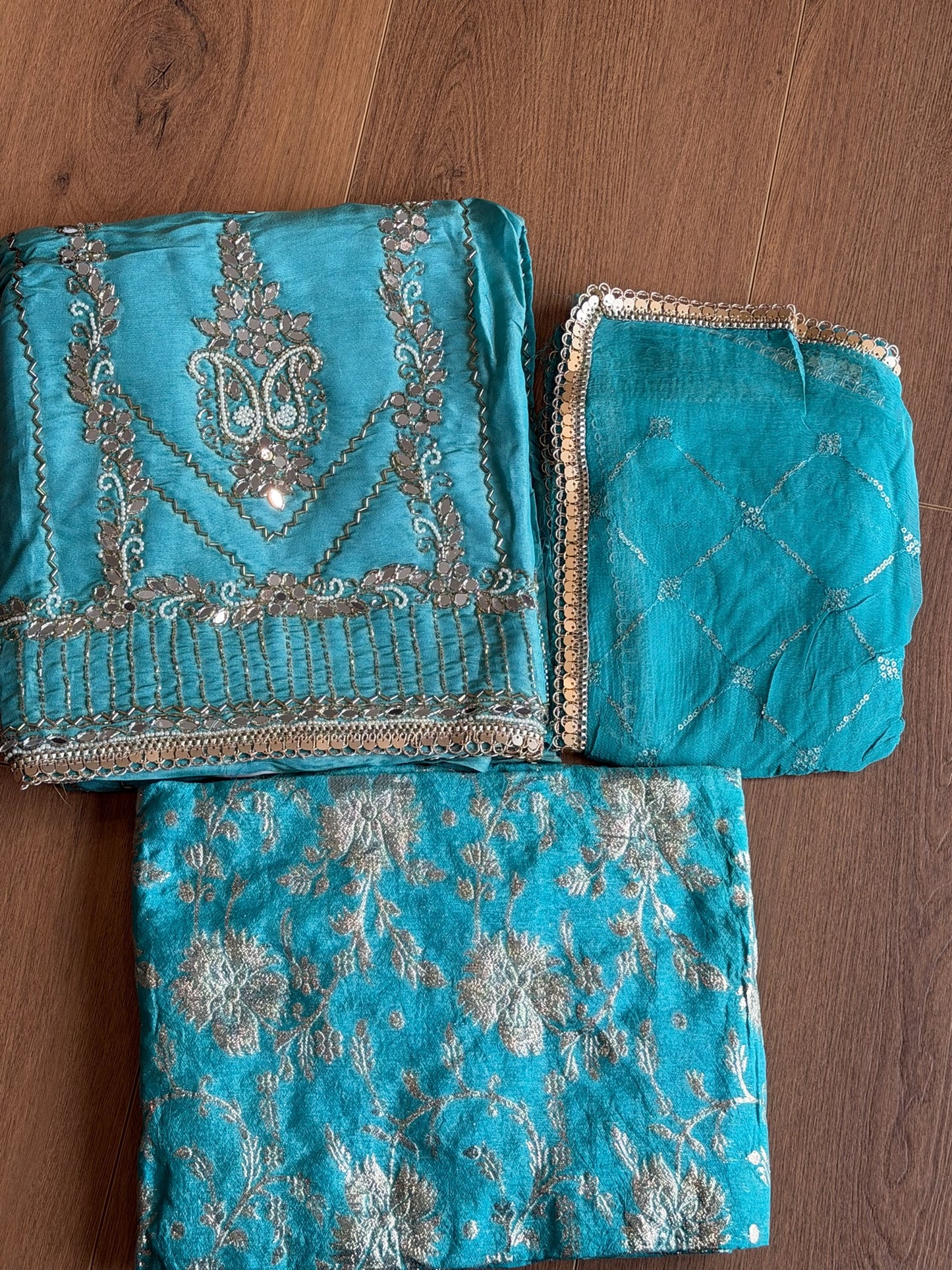 Unstitched handwork Suit - shirt: shimmer silk , bottom : Banarsi , Duppata : chiffon ( colour - firozi )