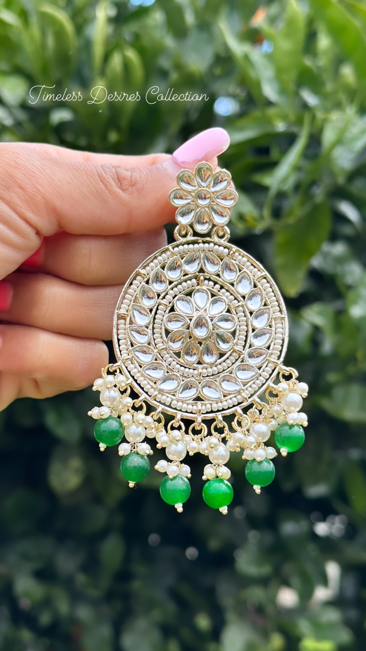 Green pearl loaded earrings