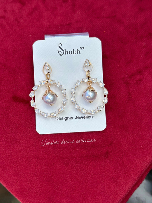 Pearl drop golden earrings in western style