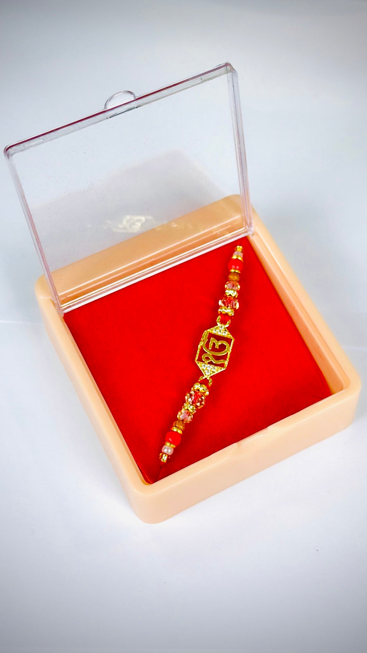 ੴ  Rakhi / Rakhdi box in American Diamond - Code A48