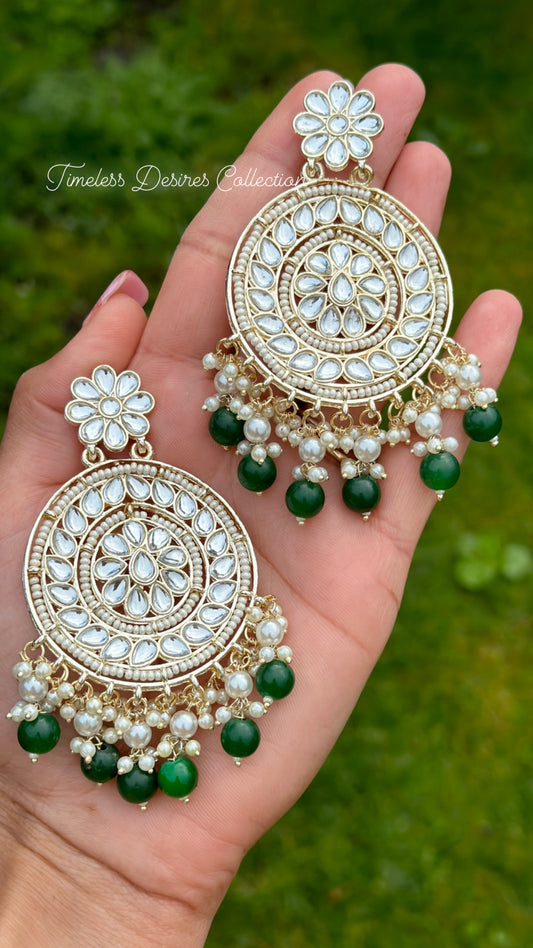 Green pearl loaded earrings