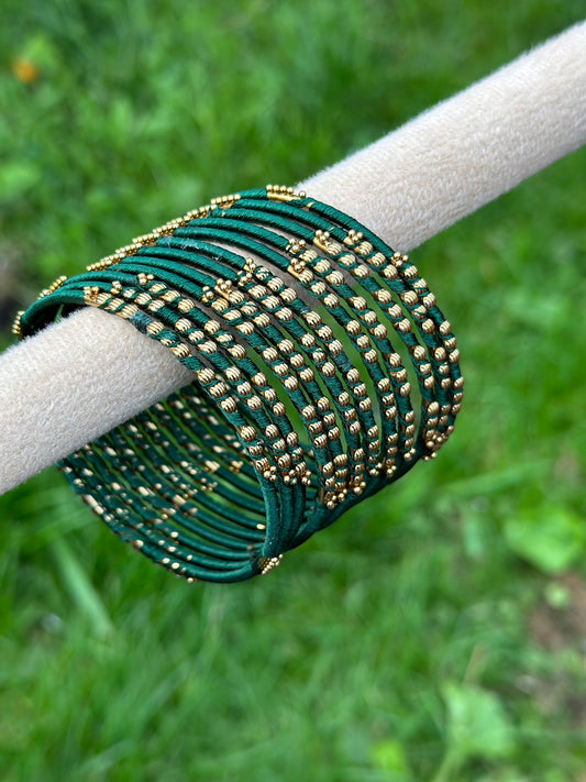 thread bangles in bottle green