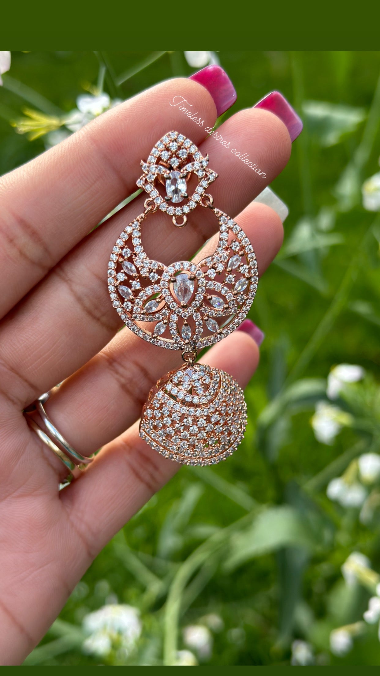 American diamond Jhumka earrings in rose golden polish