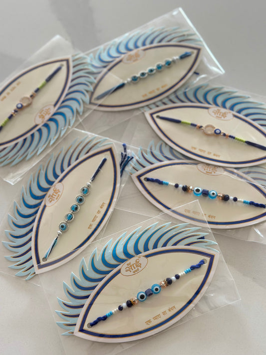 Evil Eye Rakhi / Rakhdi packs with assorted designs   ( per pc )