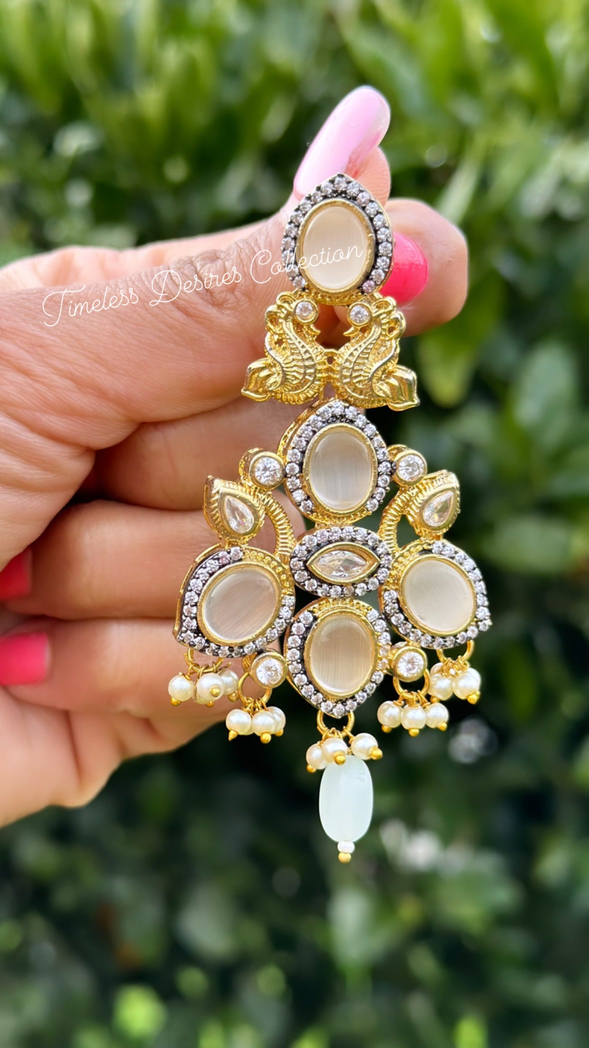 Golden and White statement earrings with Monalisa stones in Gold plating