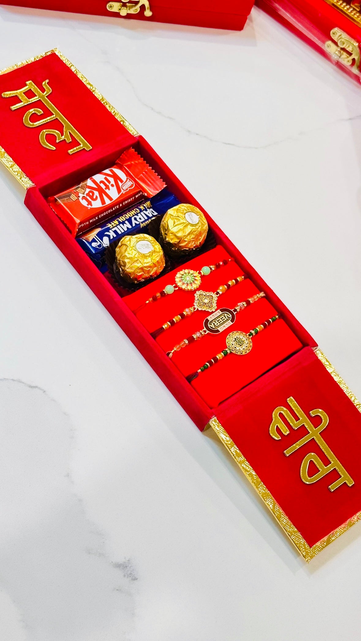 Rakhi Hamper Box with 4 Rakhdi and chocolates - Bunndle box (assorted designs)