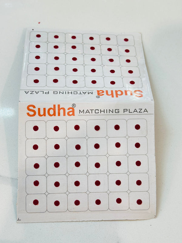 Round shape small bindi card in Maroon colour – Timeless desires collection