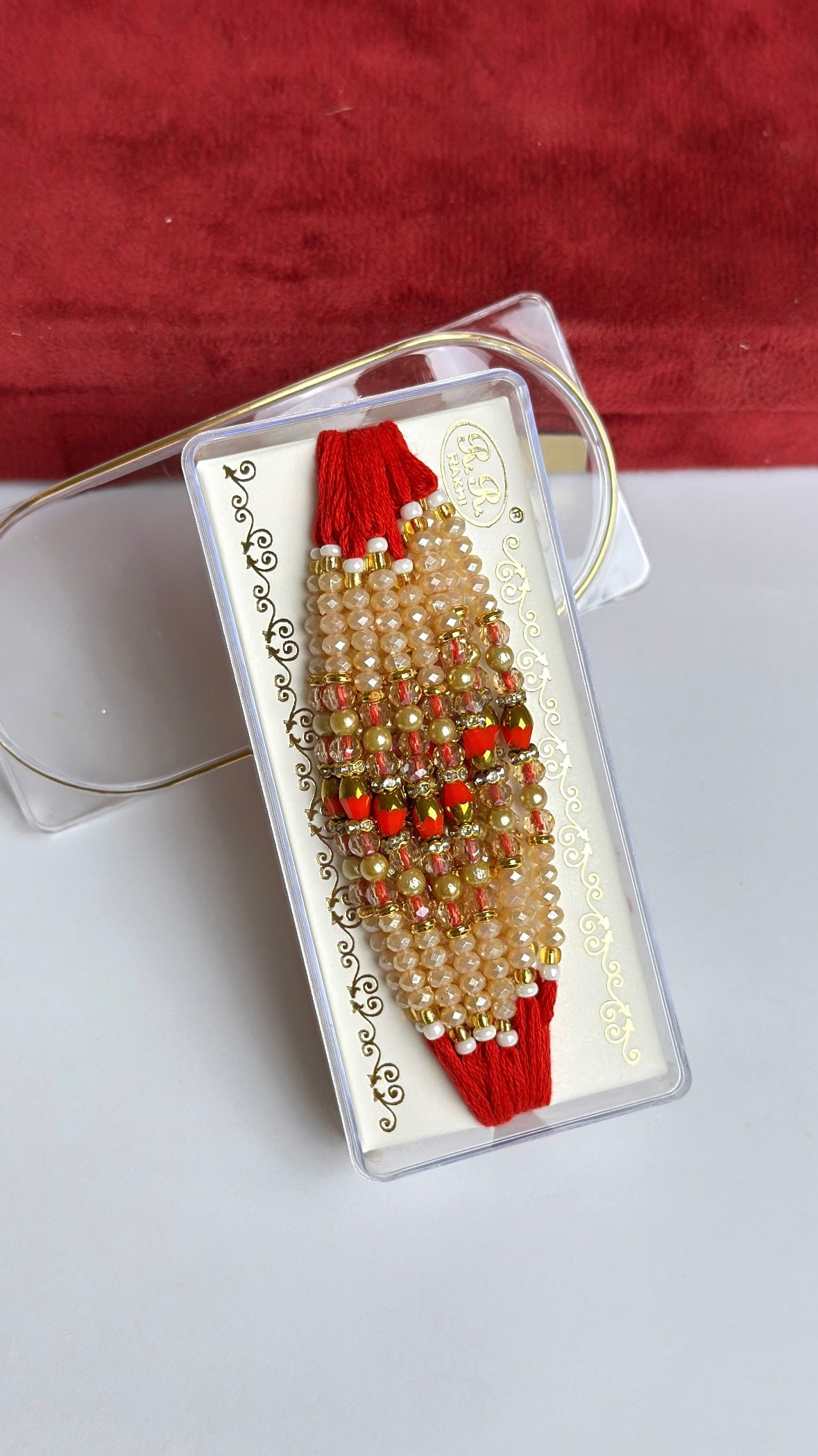 Golden and Red Pearl Loaded Rakhi / Rakhdi Thread in Bundle ( 12 PC set) - Code A52