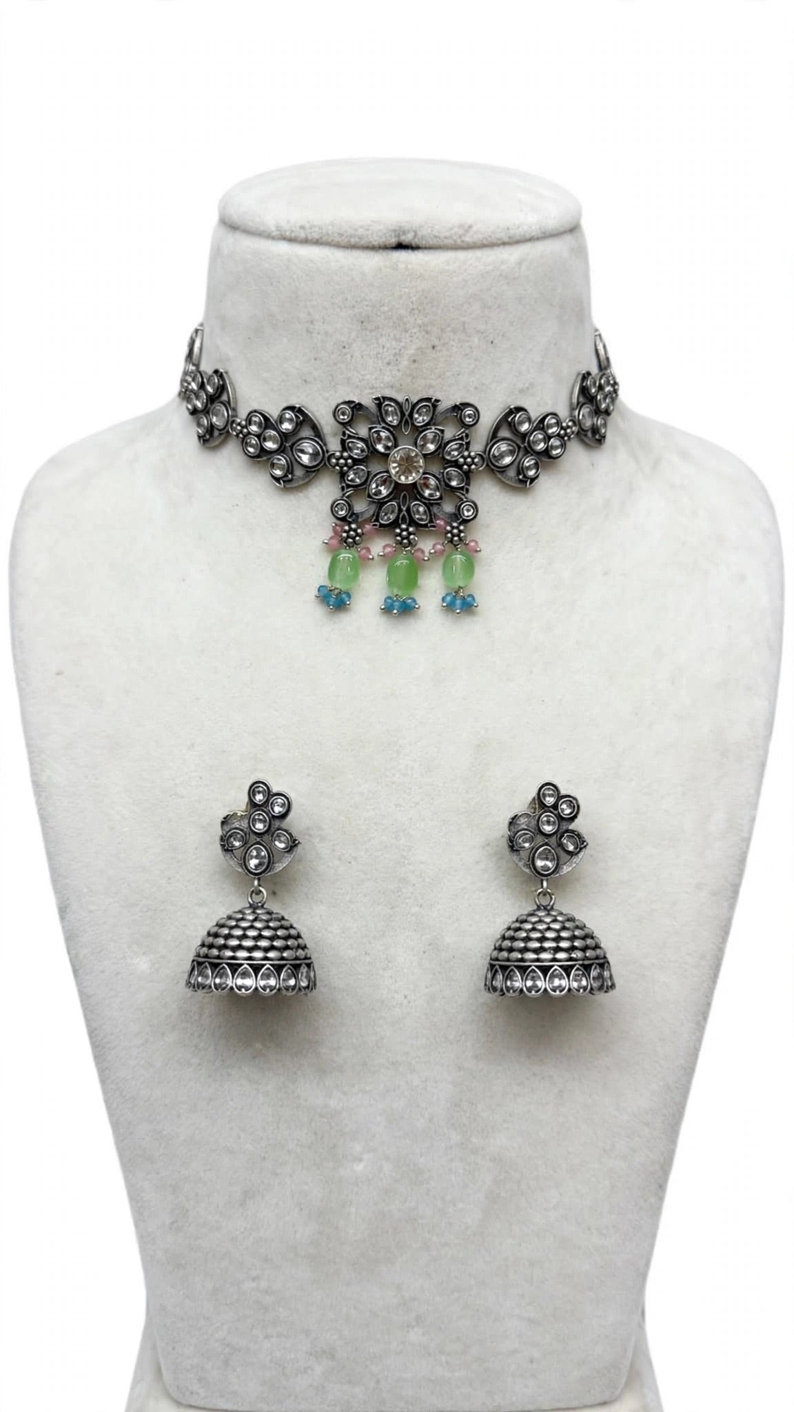 Necklace set with earrings and tikka