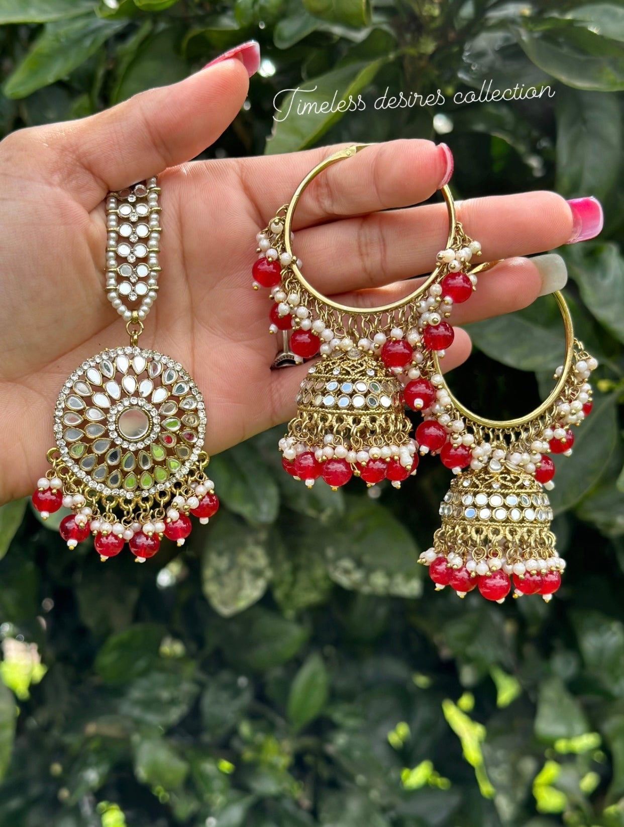 Red waliya earrings with Tikka in mirror