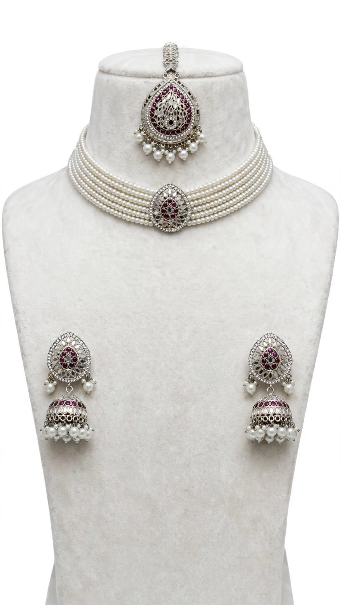 Necklace set with earrings and tikka