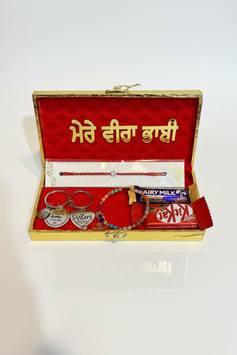 Veera bhabi rakhi hamper box - Includes Hamper box , Rakhi thread , Bracelet for bhabi , and gift items for couple with sweets ( pls note rakhi designs can be assorted depending on availability)