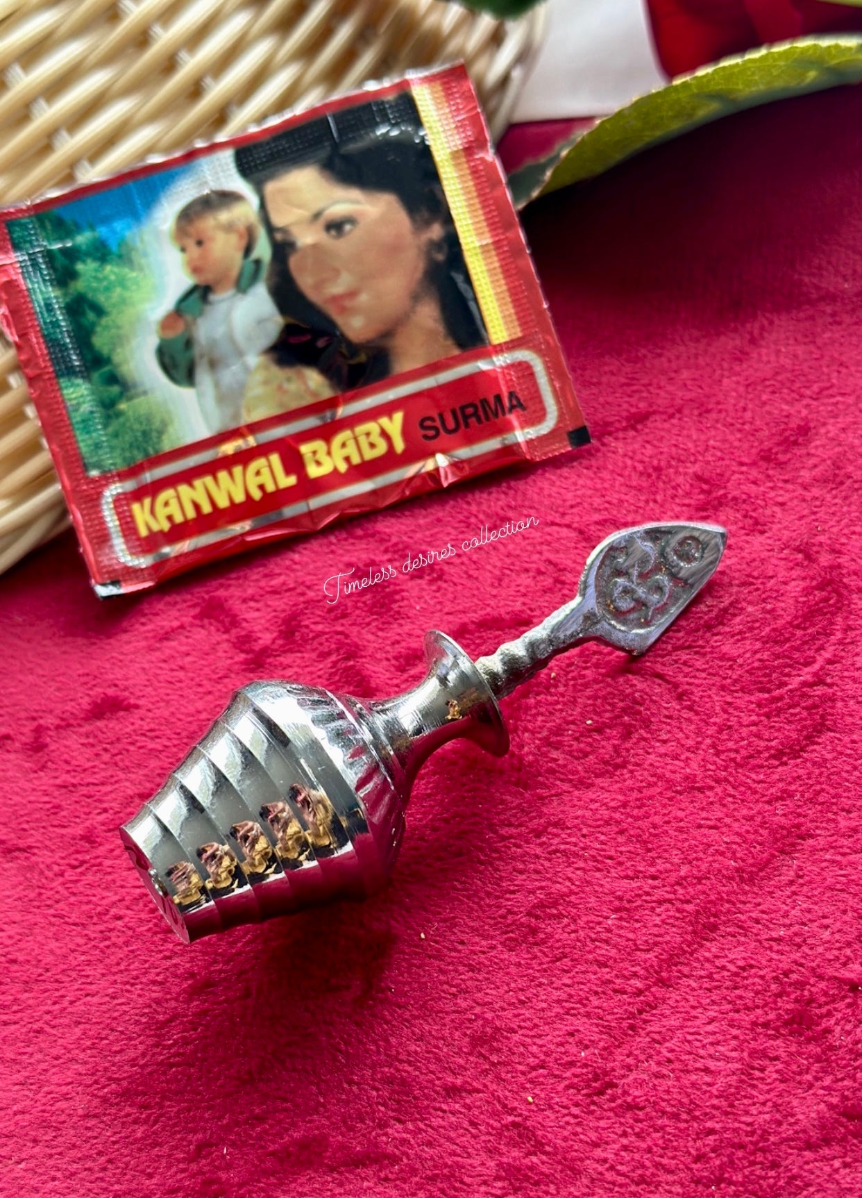 Traditional surmadani with a pack of fresh Surma filling