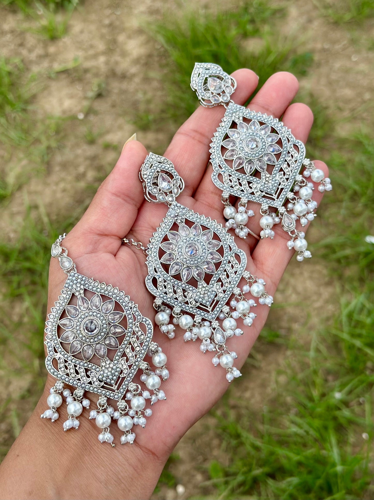 Silver earrings with tikka- J10