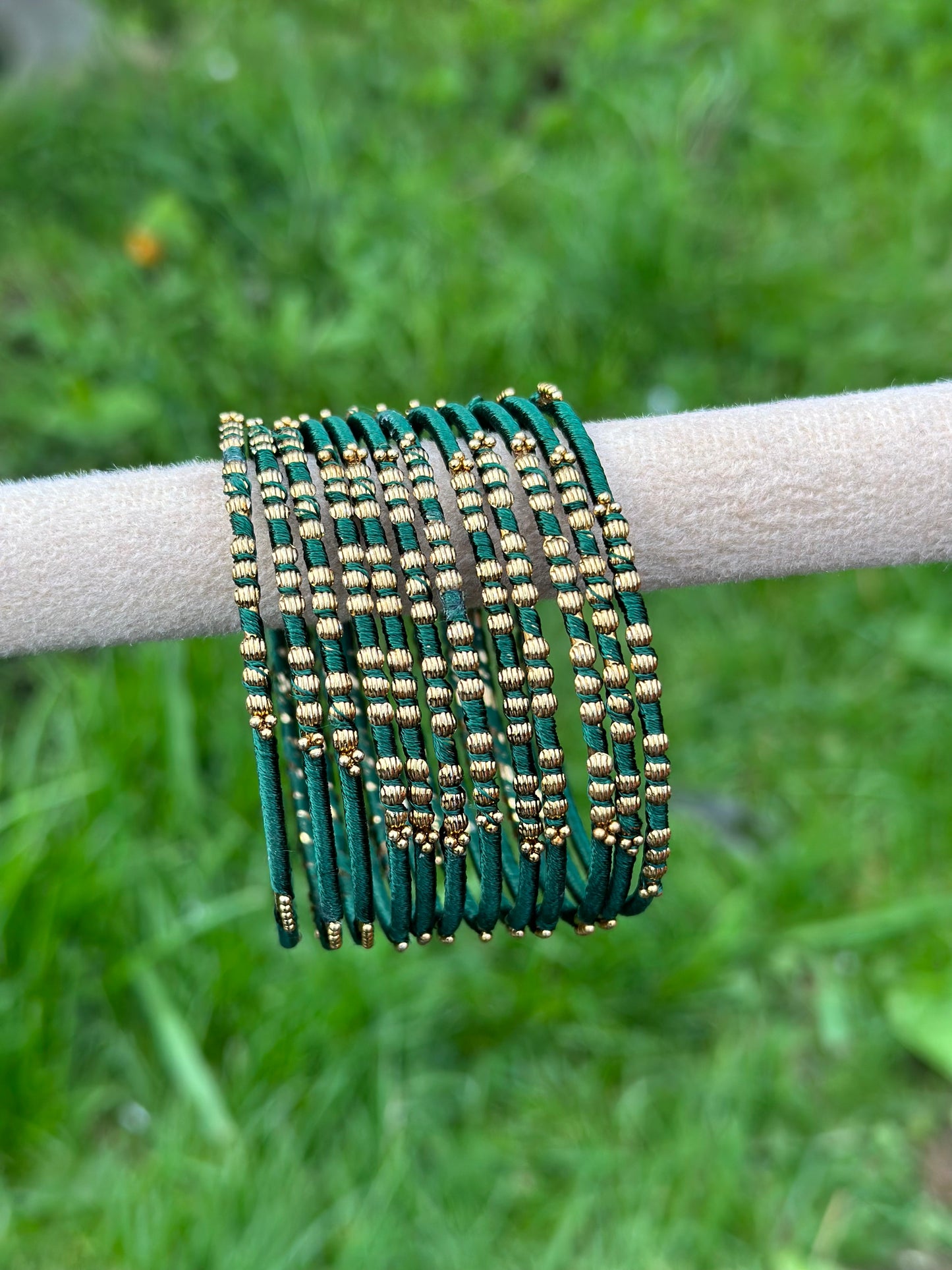 thread bangles in bottle green