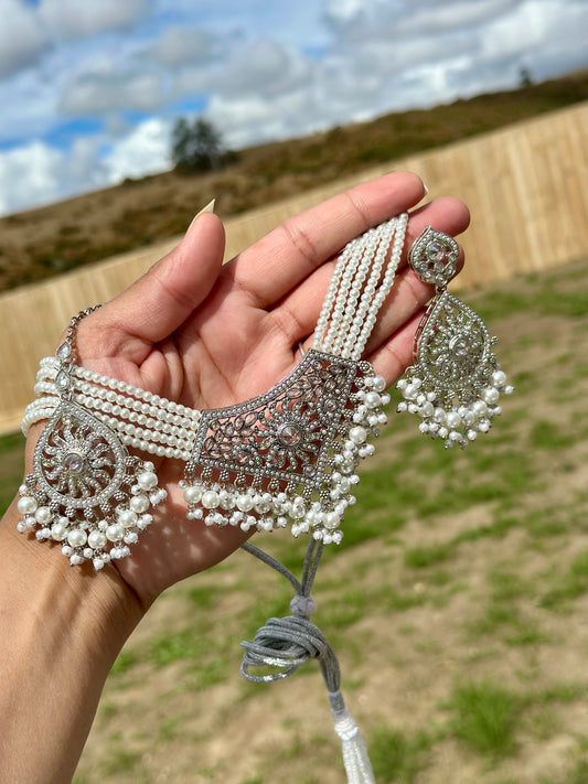 Silver necklace set with earrings and tikka- J26