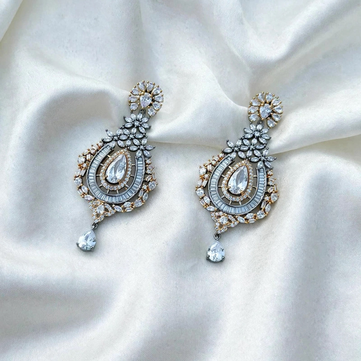 Golden and silver  American diamond earrings ( Victorian polish )