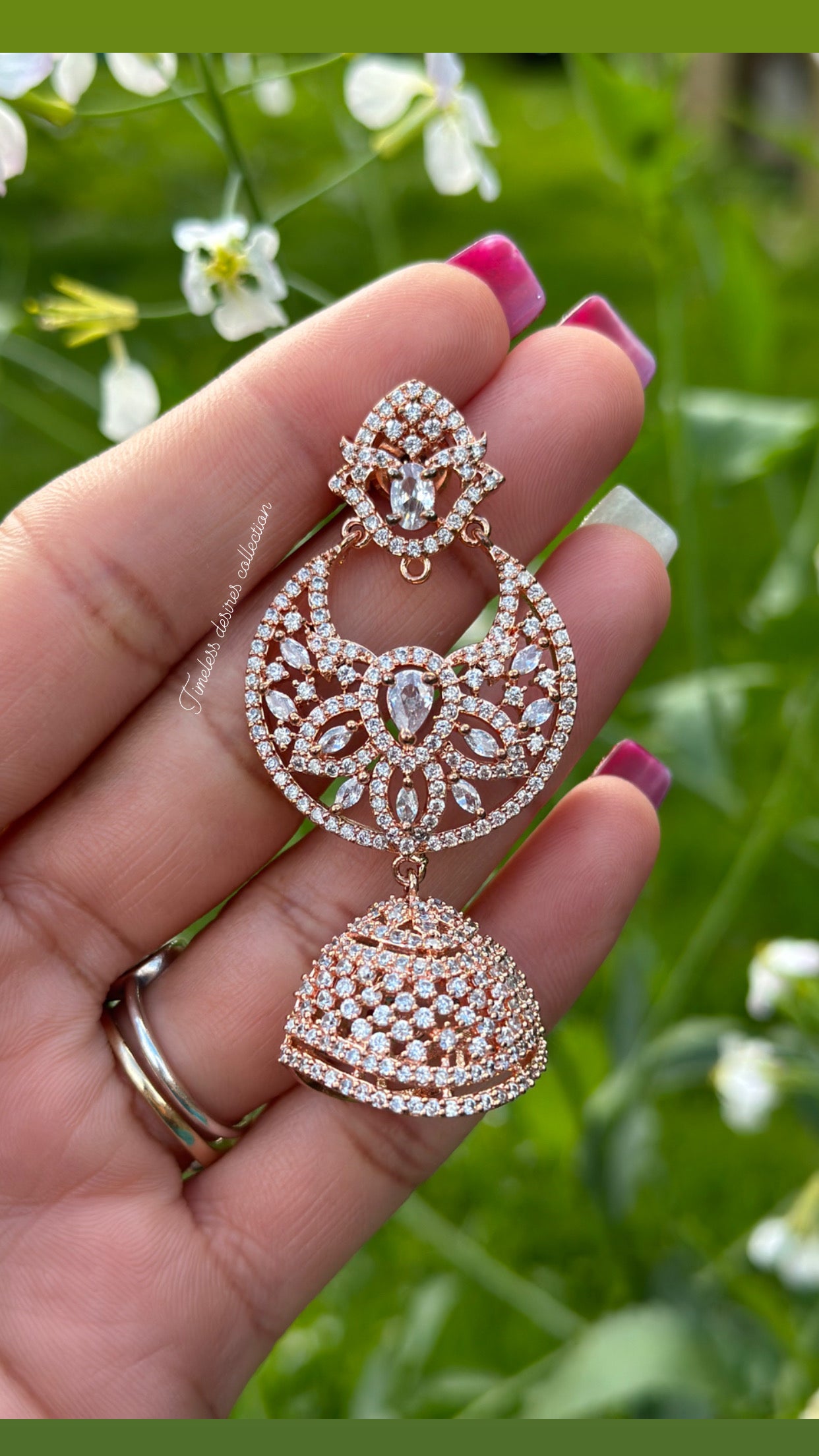 American diamond Jhumka earrings in rose golden polish