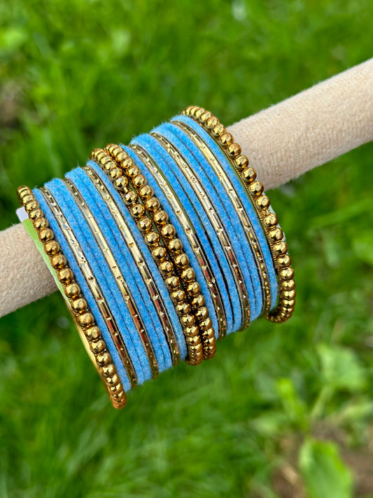 Baby Blue velvet bangles set with golden beaded kangan’s