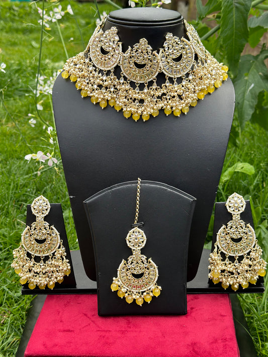 Yellow pearl loaded Necklace / choker set in Kundan