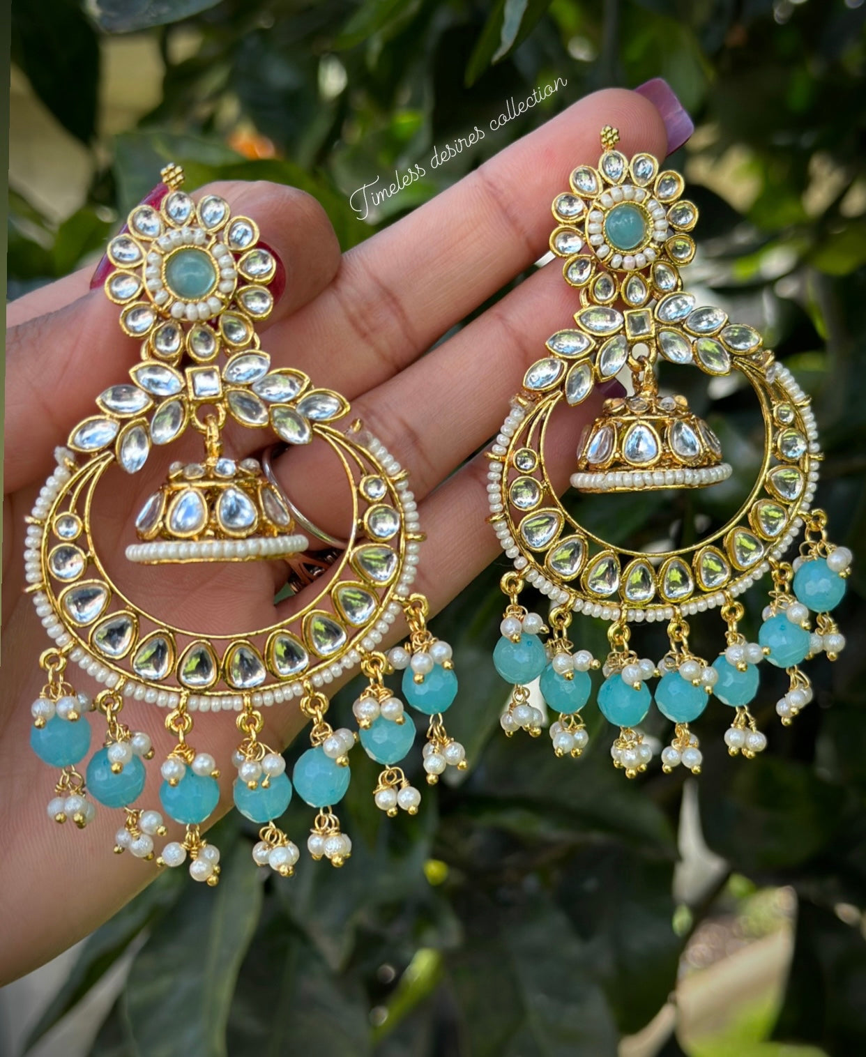 Sky blue Jhumka drop earrings in Kundan