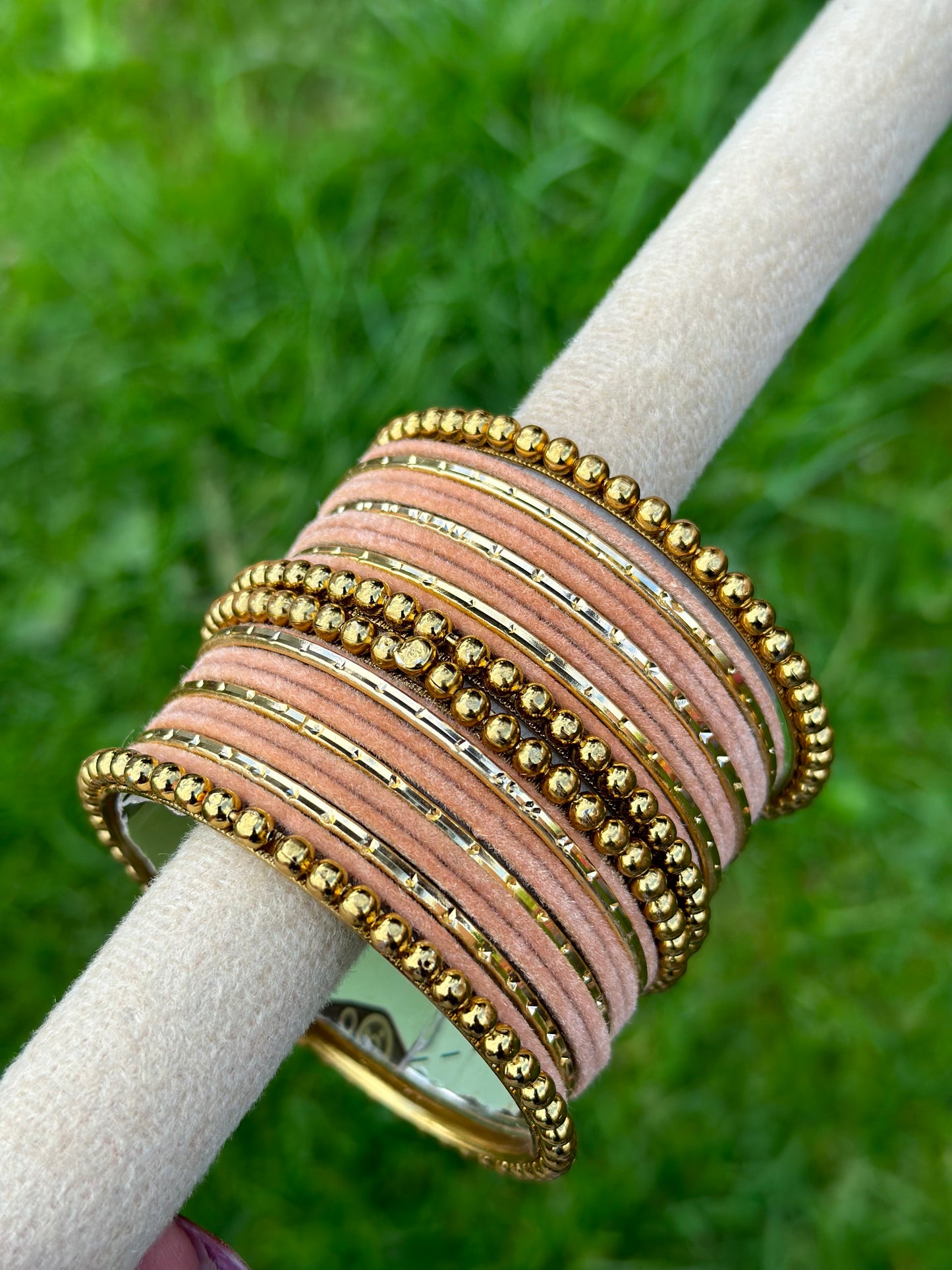 Peach velvet bangles set with golden beaded kangan’s