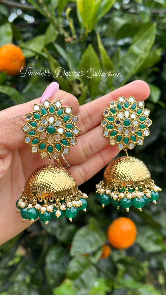 Green Jhumka earrings in mirror