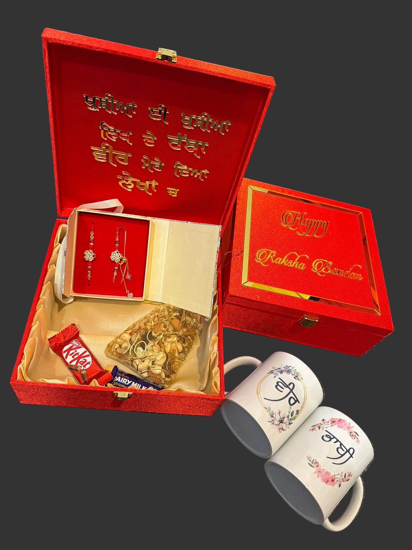 Premium couple hamper box - includes customised hamper box , customised mugs , American diamond couple rakhi gift pack , mixed Nuts , Chocolates