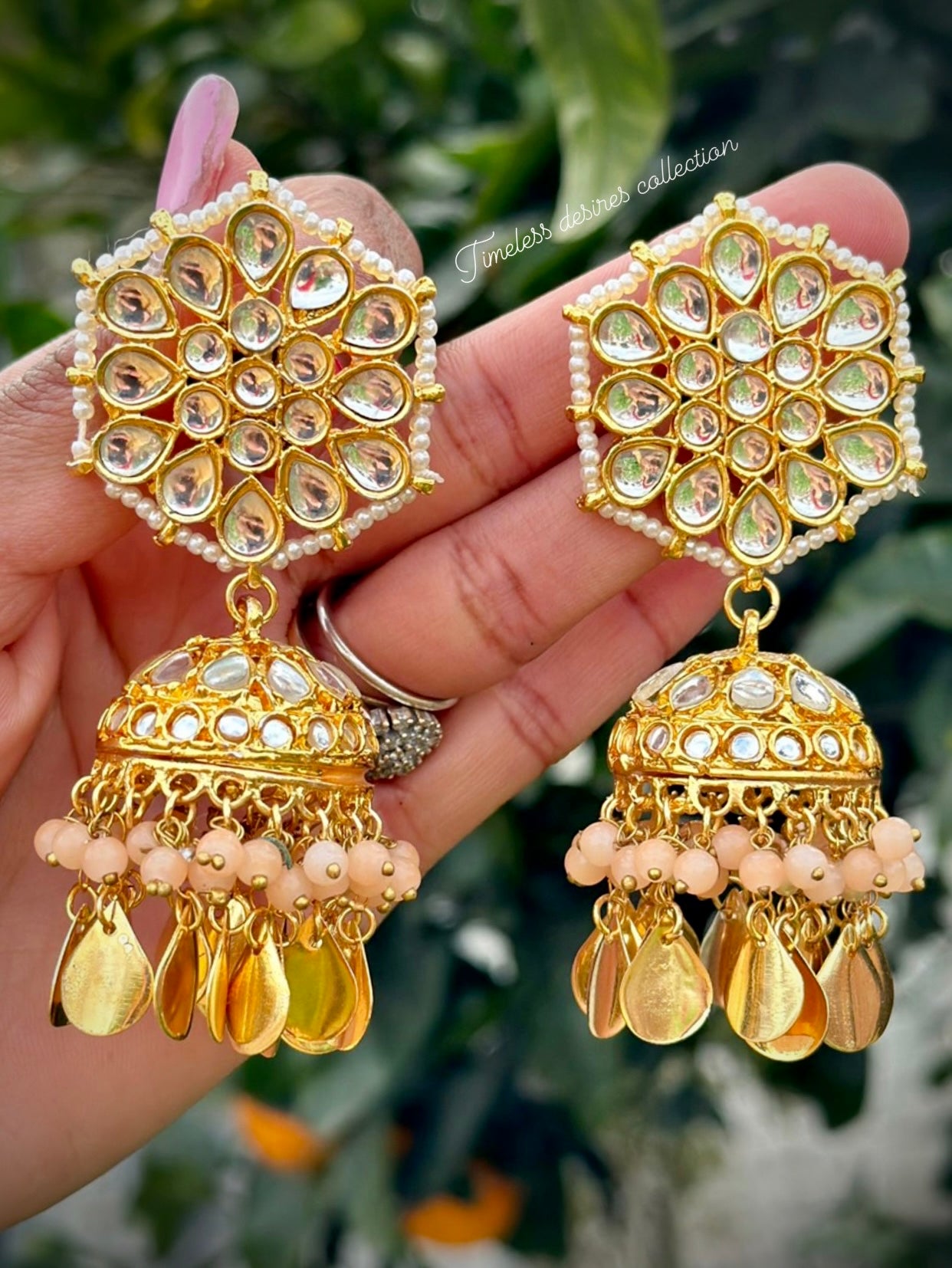Peach Jhumka earrings in Kundan with Pipal Patti