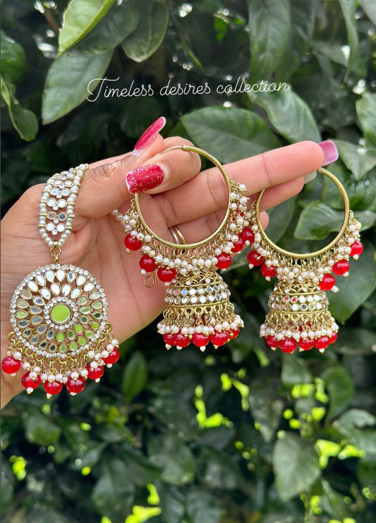 Red waliya earrings with Tikka in mirror