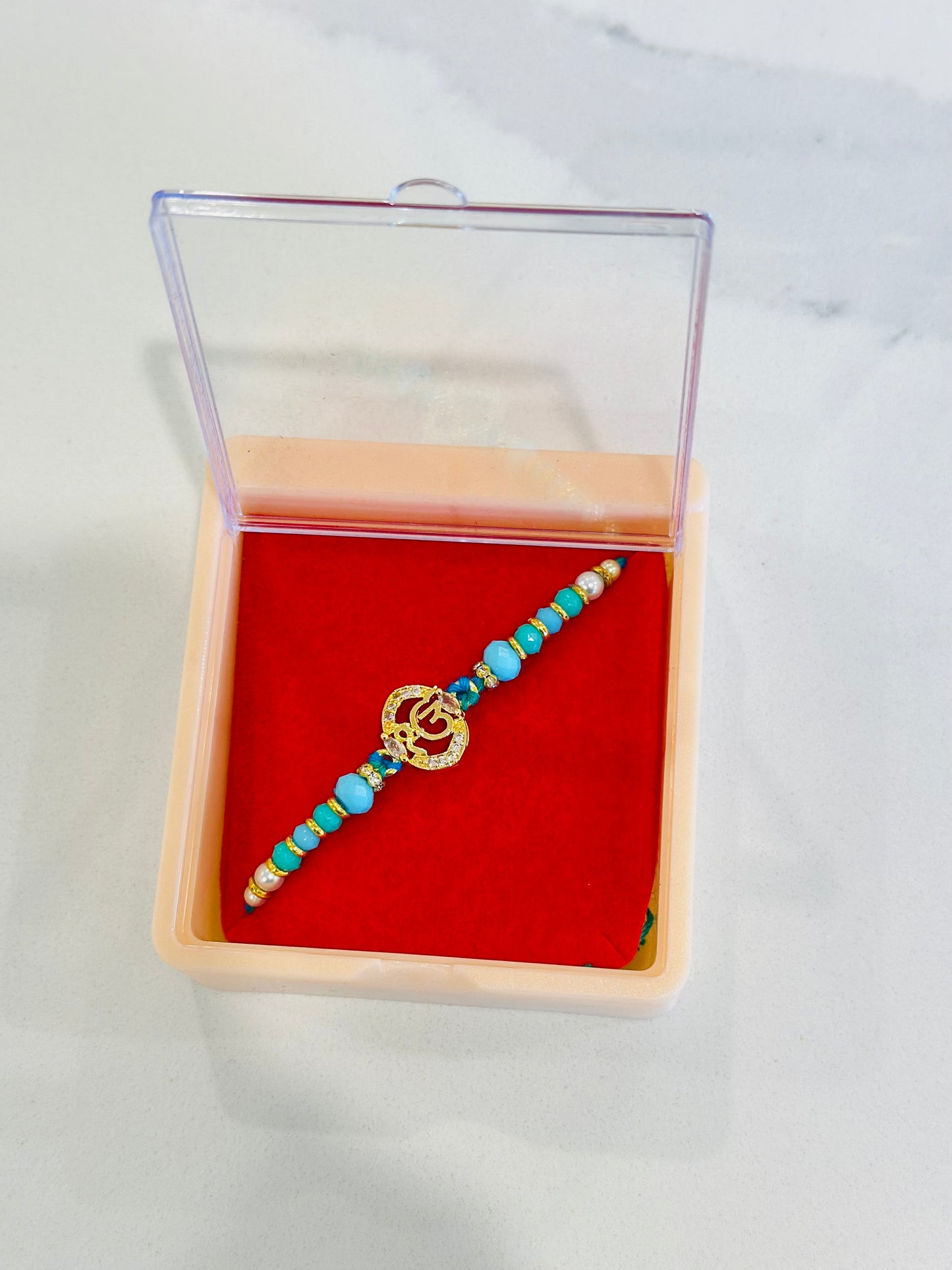 ੴ  ik omkar Rakhi / Rakhdi box in American Diamond