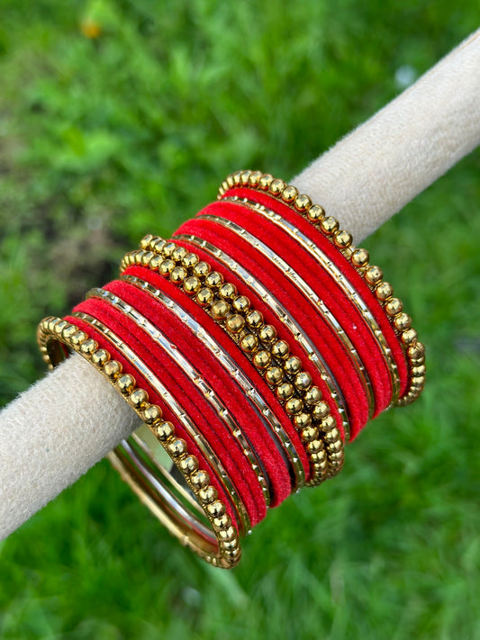 Red velvet bangles set with golden beaded kangan’s