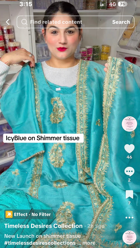 Icy blue suit on shimmer tissue