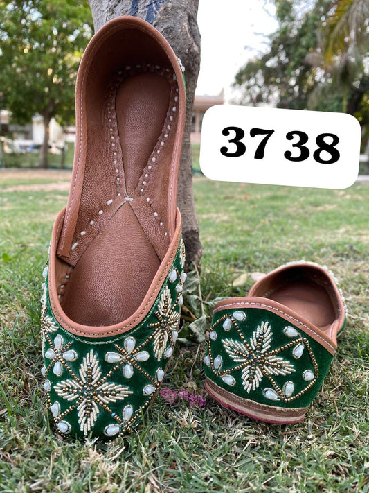 Punjabi jutti in green colour with hand work